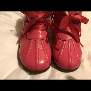 Pink patient leather Uggs boots